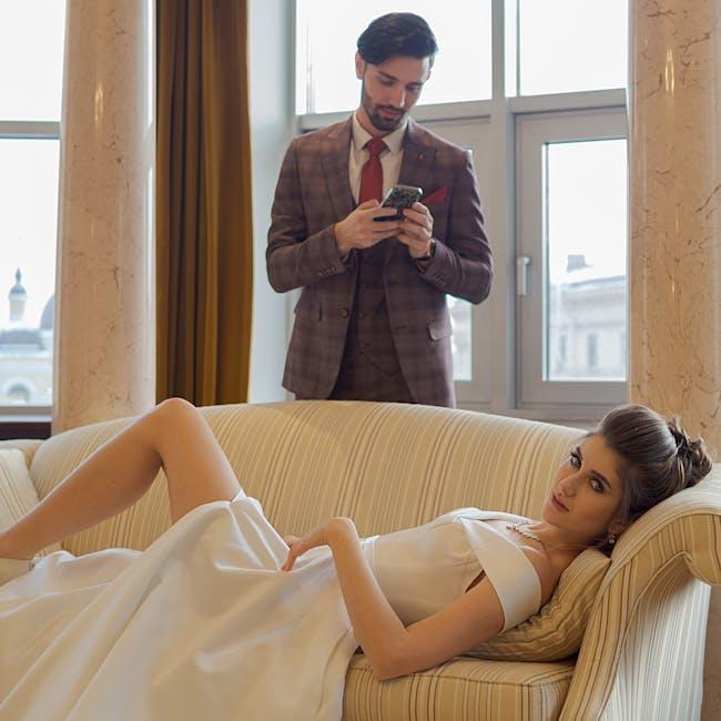 Wedding couple on luxurious couch